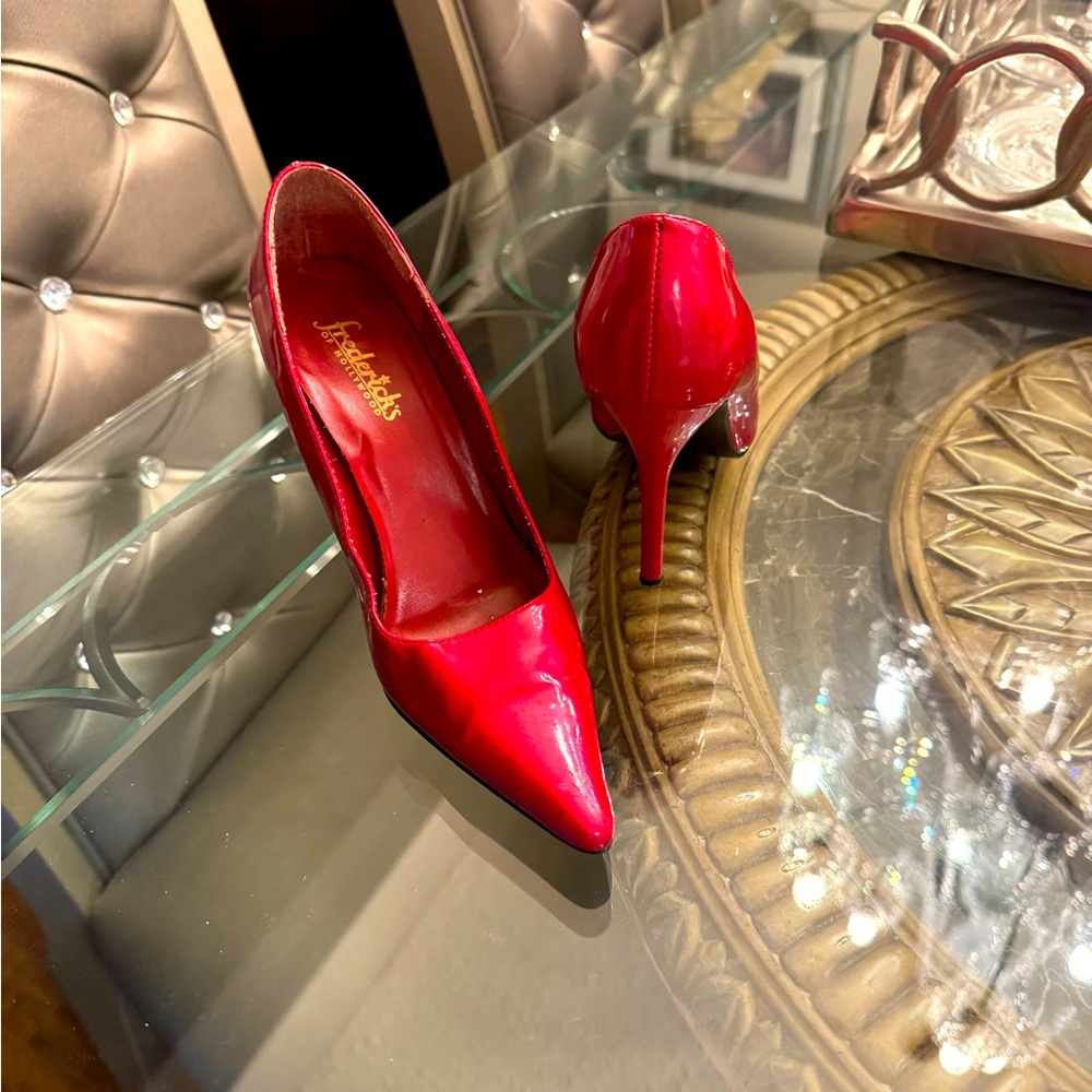 Metallic red pump shoes from Frederick’s of Hollywood.
